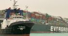 Massive container ship stuck sideways in the Suez Canal blocking all traffic