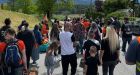 Truck driver charged after vehicle plowed into residential school memorial march