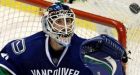 Sanford, Canucks sink Red Wings in OT