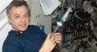 Astronaut Thirsk has space chat with Jean Beliveau