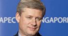 Harper urges climate rules for all countries