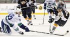 Canucks host red-hot Predators