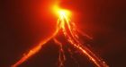 Thousands flee rumbling volcano in Philippines