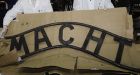 Cops: Foreigner commissioned Auschwitz sign theft