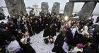 Druids, pagans mark solstice at Stonehenge