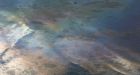 Robots secure massive dome over oil-spewing well