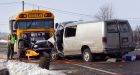 Van hits school bus in Quebec, killing 4 people