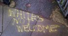 Police probe into 'whites not welcome' graffiti outside London primary school
