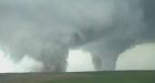 In Nebraska, Twin tornadoes touch down killing 1 and hurting 16