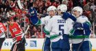 Sedin leads Canucks over Blackhawks in OT