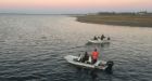 Dolphins herded to open water off Lamque