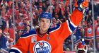 Oilers down Flames 7-4